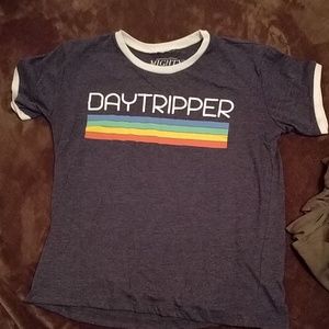 Size Large shirt that says Daytripper